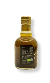 Aromatic organic extra virgin olive oil enriched with organic black garlic extract
