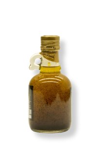 Aromatic organic extra virgin olive oil enriched with organic black garlic extract